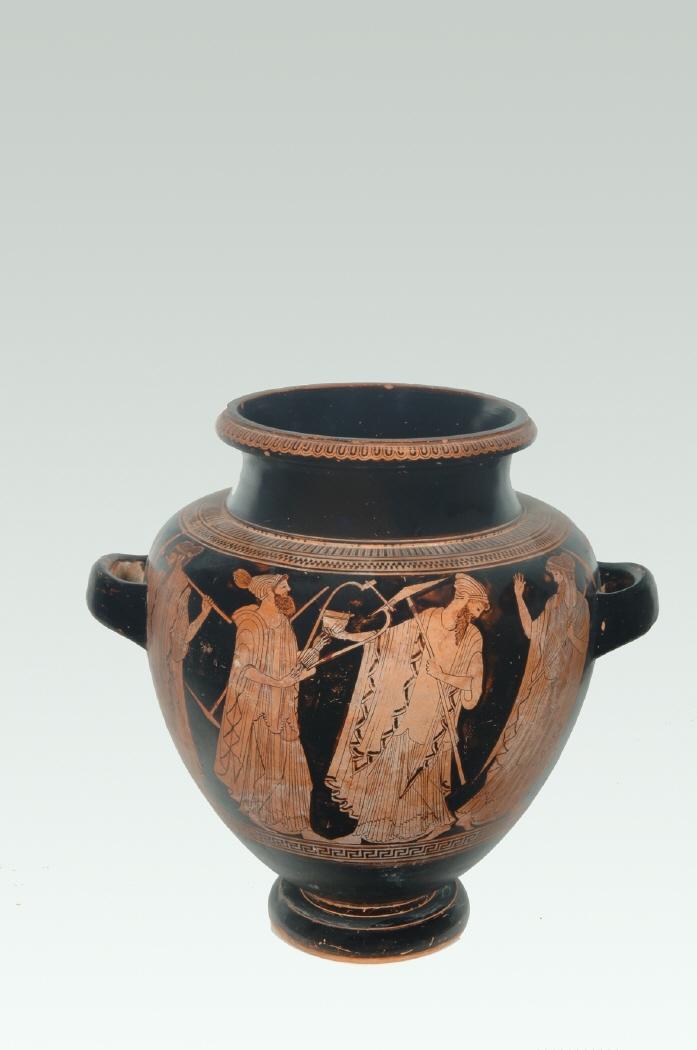 Estamno con simposiastas bailando al son del bárbito